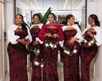 Bridesmaids in matching gowns